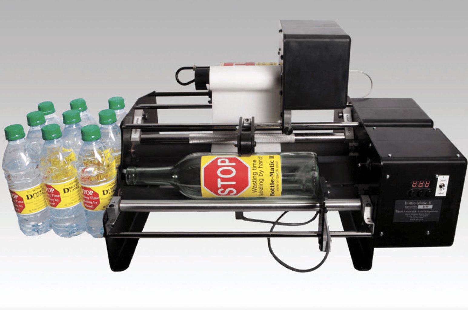 DELUXE Dispensa-Matic Dual Label Bottle-Matic 16" II Electric Label Applicator / Label Dispenser (16" II Dual) SKU: Bottle-Matic-16-II-Dual-Deluxe 1 Bottle-Matic-10-Label-Applicator